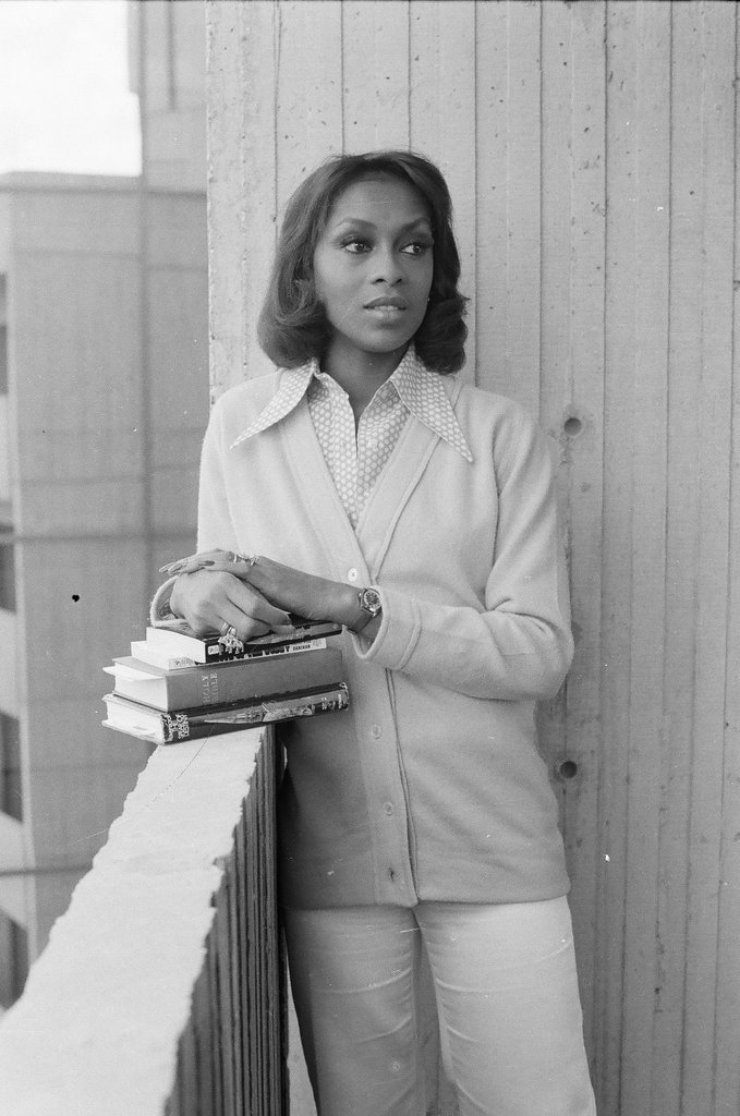 Lola Falana posing with stack of books - Fred Stein for Chicago Daily News