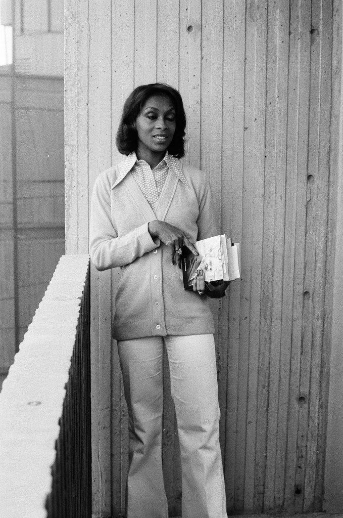 Lola Falana posing with stack of books - Fred Stein for Chicago Daily News