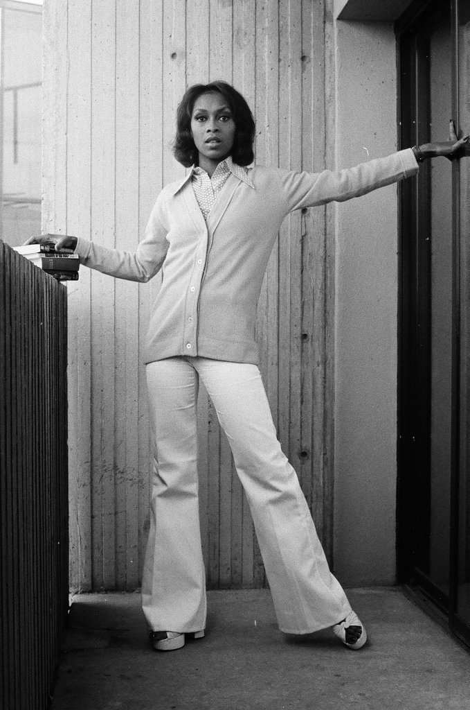 Lola Falana posing with stack of books - Fred Stein for Chicago Daily News
