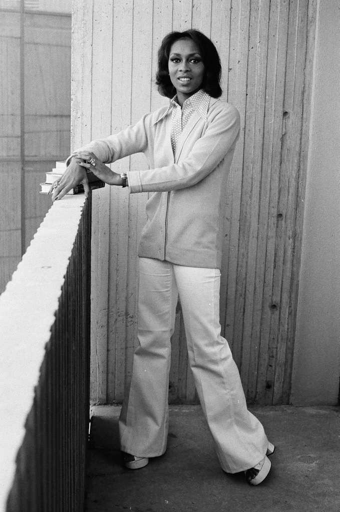 Lola Falana posing with stack of books - Fred Stein for Chicago Daily News
