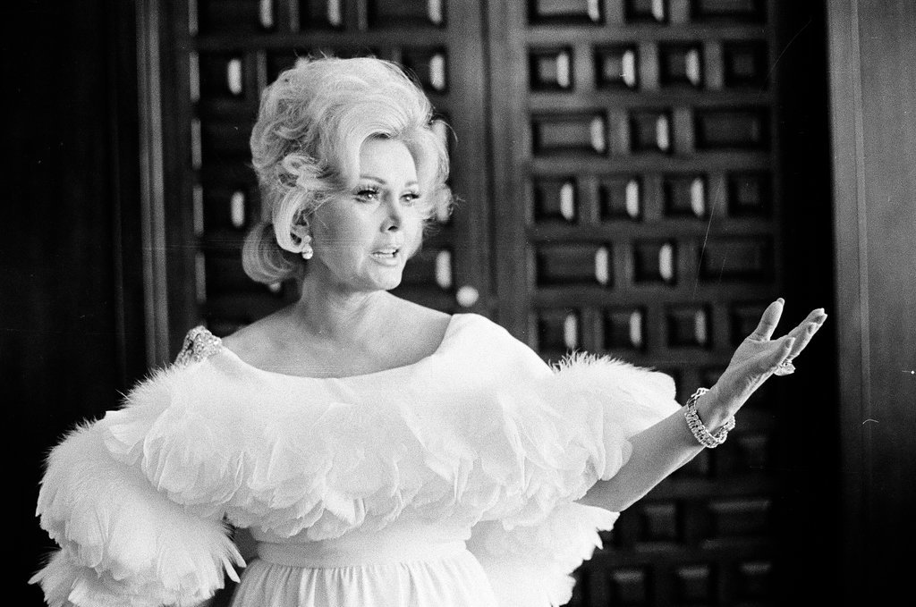 Zsa Zsa Gabor posing in different outfits - Fred Stein for Chicago Daily News