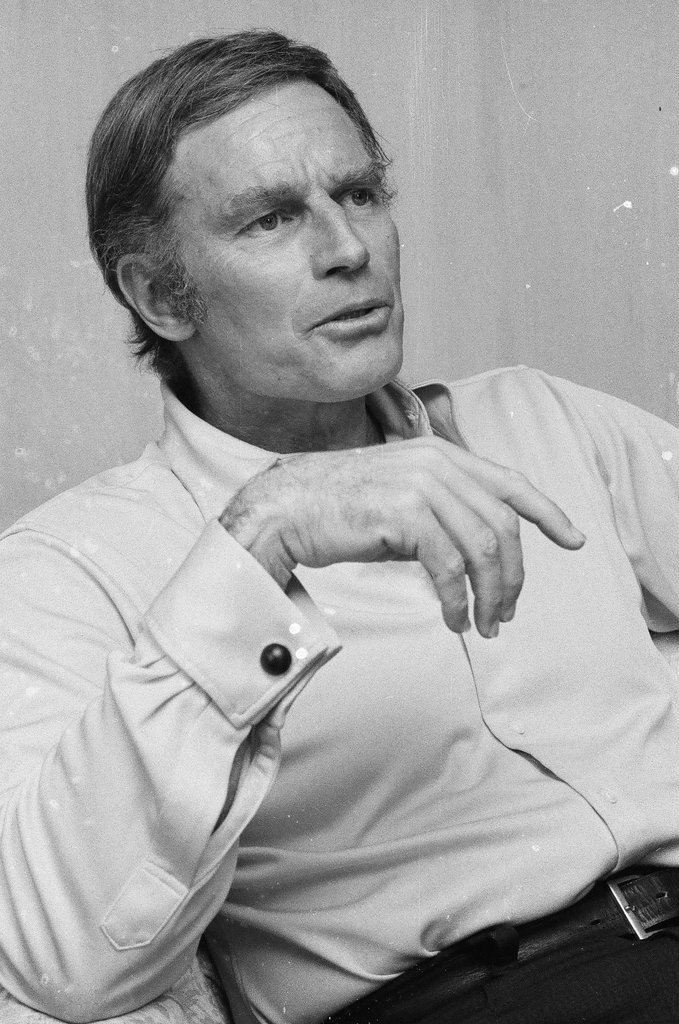 Charleton Heston sitting in a chair - Chuck (Charles) Kirman for Chicago Sun-Times