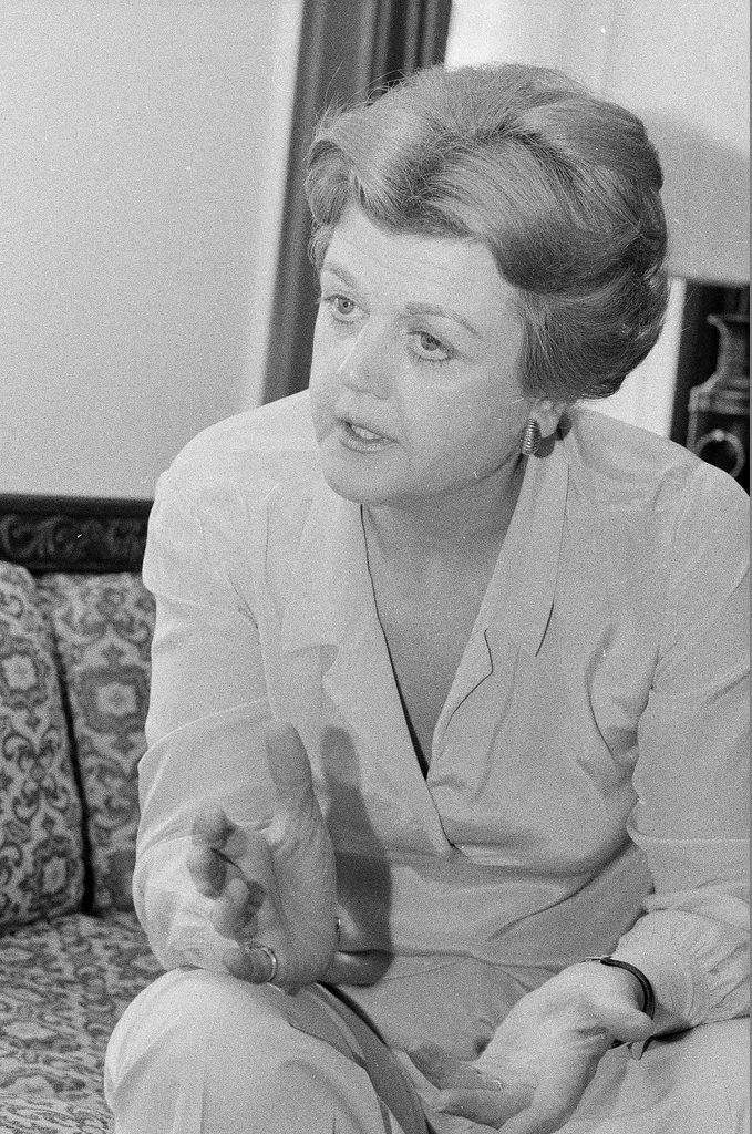 Angela Lansbury sitting on a couch - James (Jim) Klepitsch for Chicago Sun-Times
