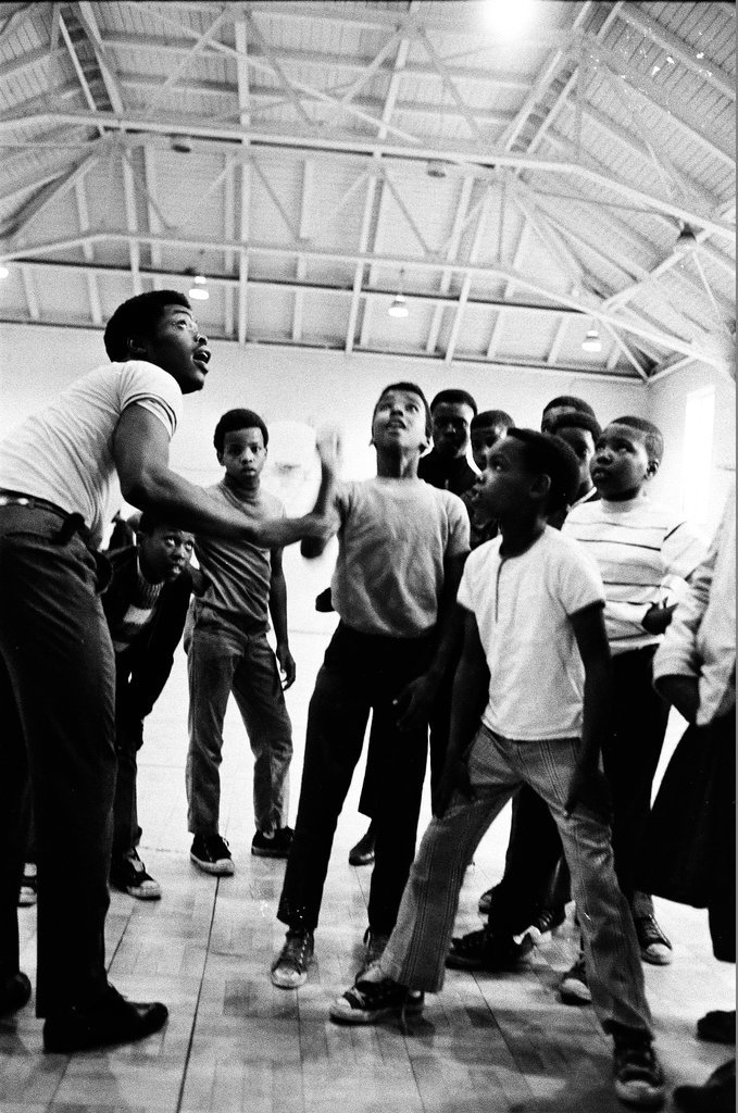 Kids play on indoor basketball court - Chicago Sun-Times