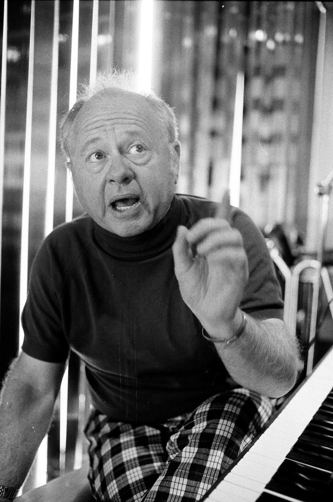 Mickey Rooney sitting at a piano - Bob Fila for Chicago Sun-Times