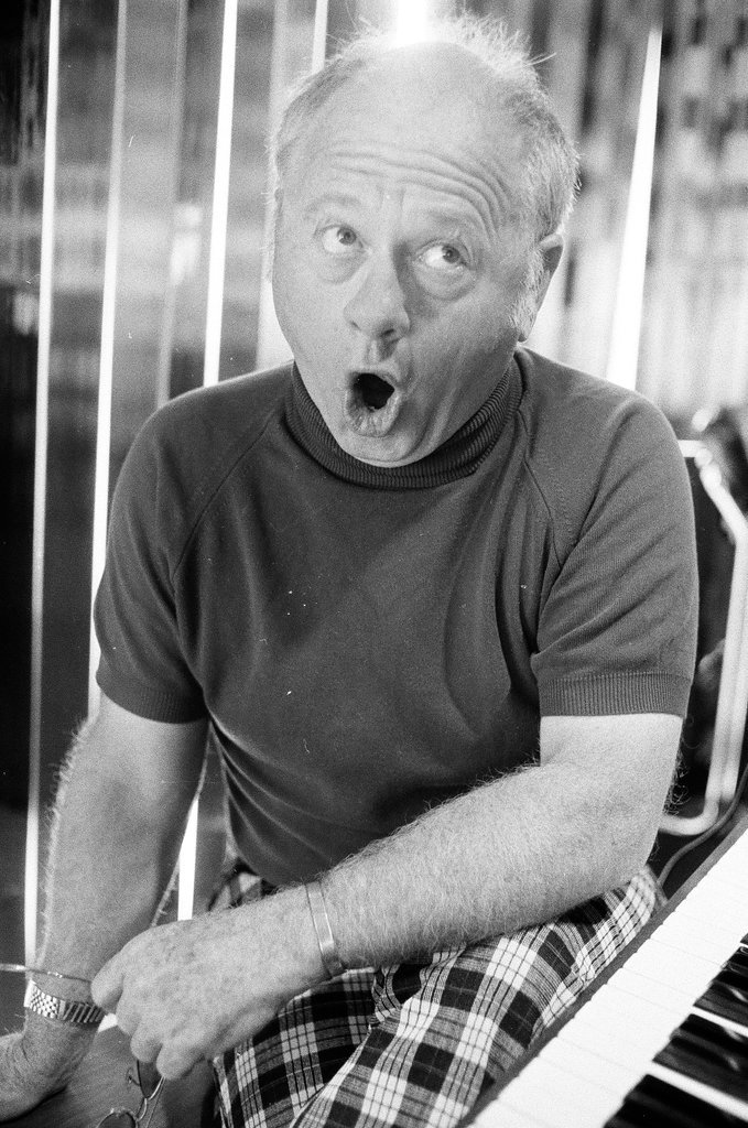 Mickey Rooney sitting at a piano - Bob Fila for Chicago Sun-Times