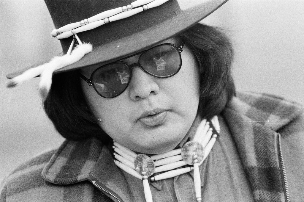 Native American holds addresses the press at totem pole - Chicago Sun-Times
