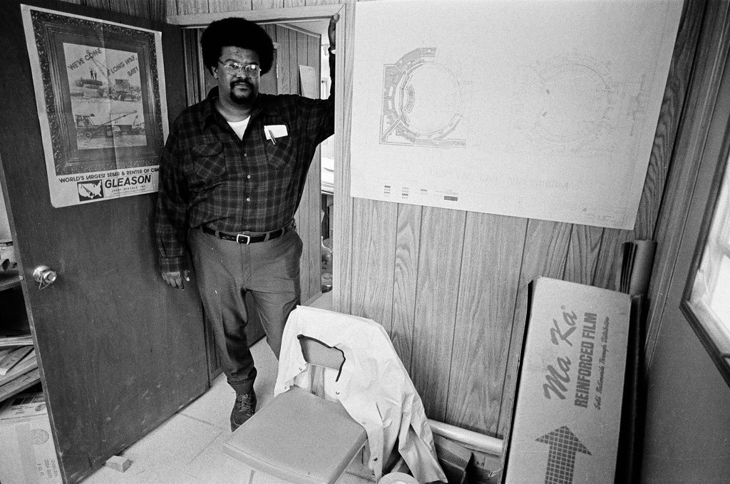 Man standing in front of laboratory under construction - Chicago Sun-Times