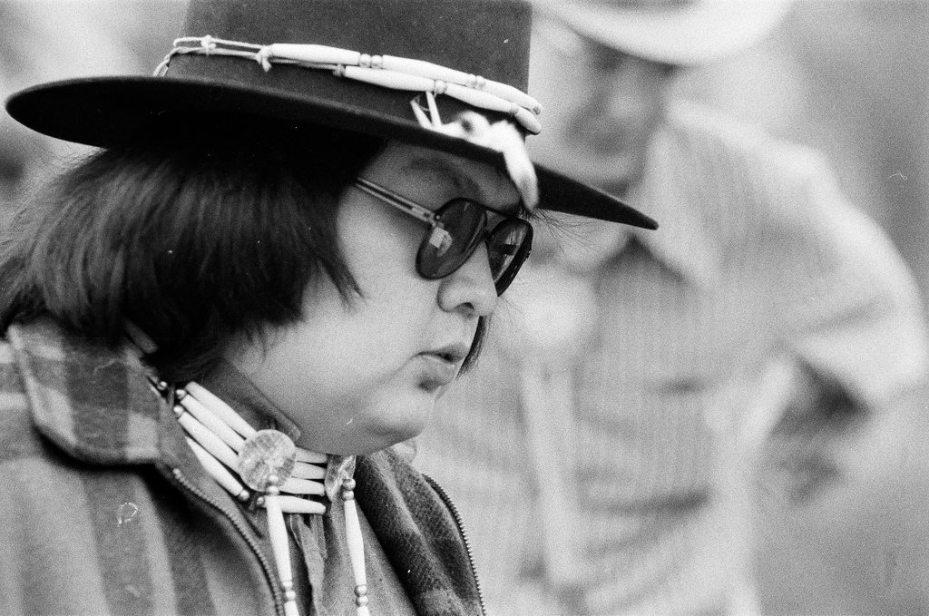 Native American holds addresses the press at totem pole - Chicago Sun-Times