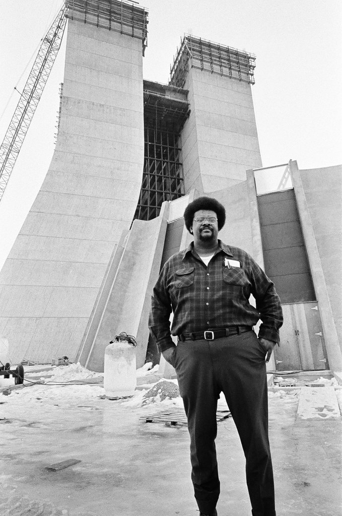 Man standing in front of laboratory under construction - Chicago Sun-Times