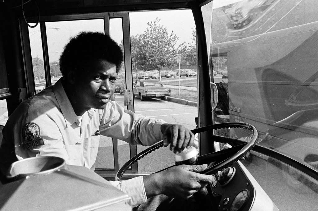 Bus driver and passengers - Chicago Sun-Times