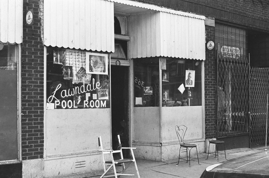 Leader of Conservative Vice Lord sitting outside pool room - Chicago Sun-Times