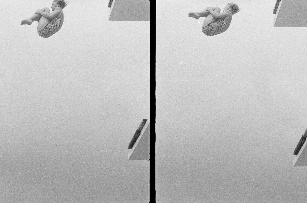 Woman dives from diving board - Joe Kordick for Chicago Sun-Times