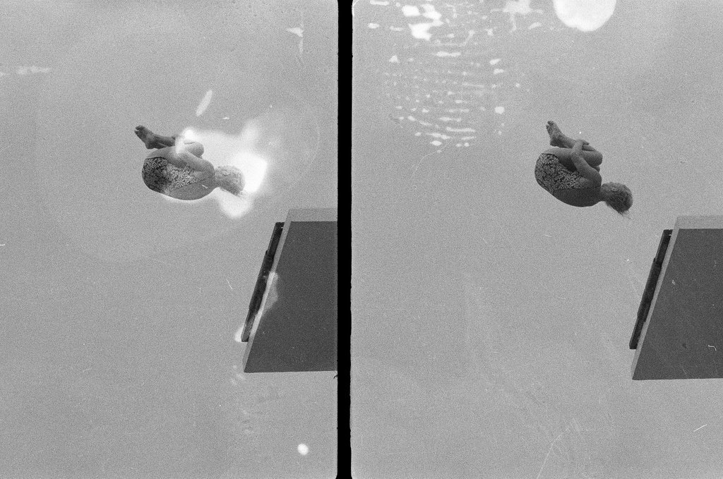 Woman dives from diving board - Joe Kordick for Chicago Sun-Times