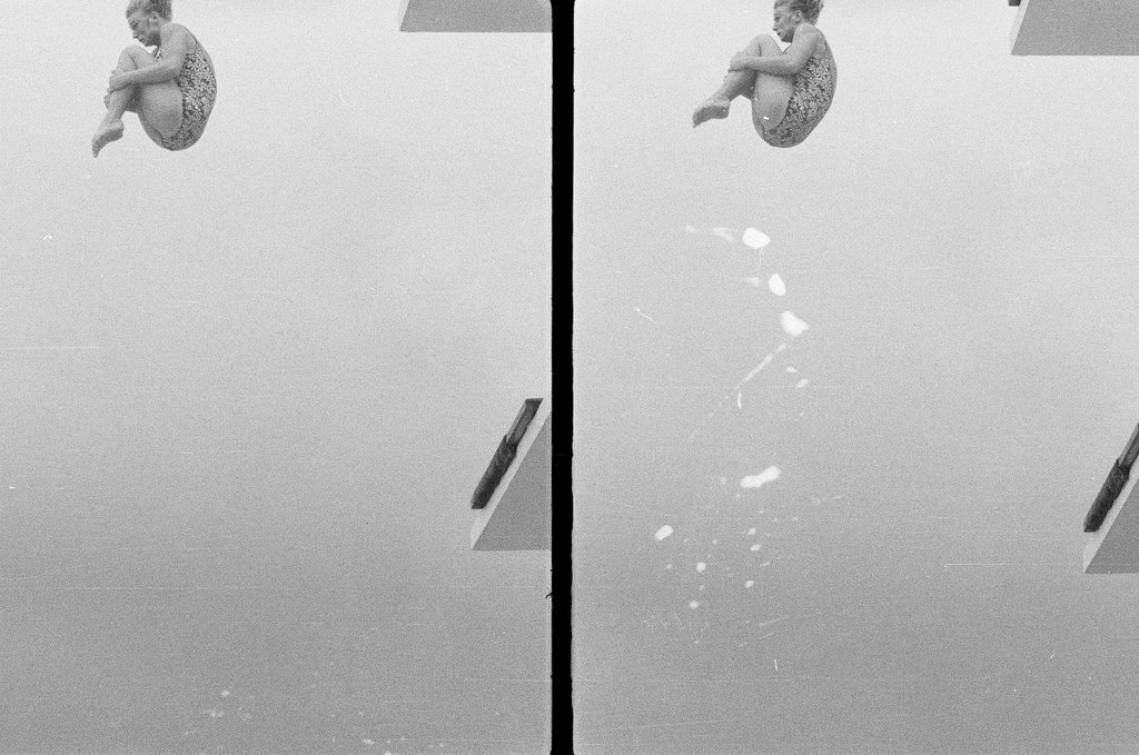 Woman dives from diving board - Joe Kordick for Chicago Sun-Times