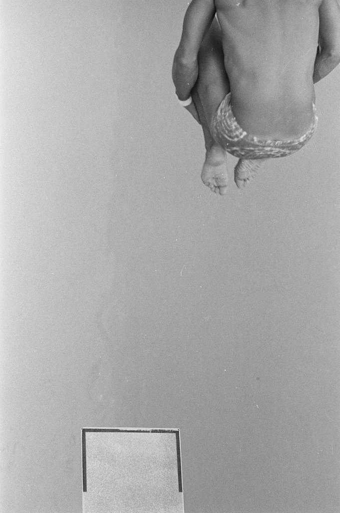 Male diver competing in Olympic diving trials - Chicago Sun-Times