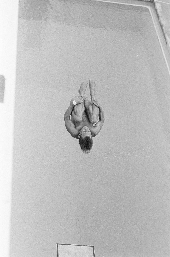 Male diver competing in Olympic diving trials - Chicago Sun-Times