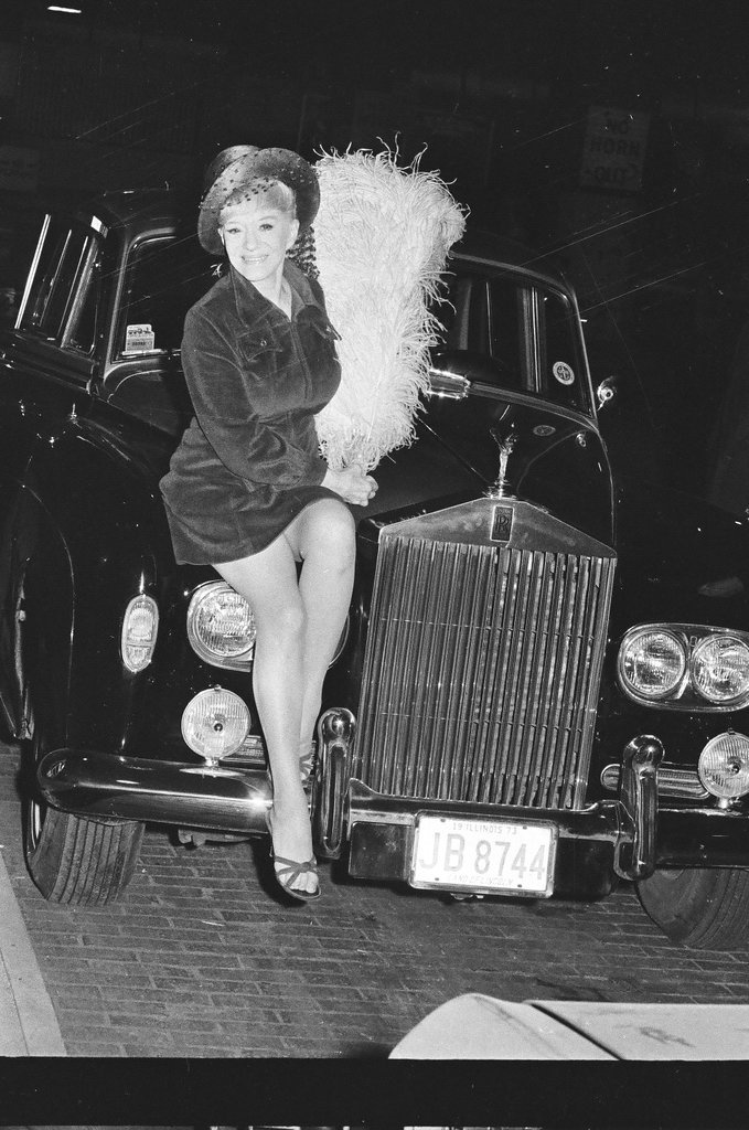 Sally Rand poses on a Rolls Royce - Jack Lenahan for Chicago Sun-Times