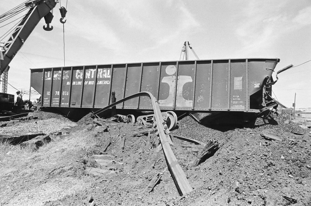 Overturned coal cars - Chicago Sun-Times
