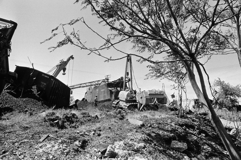 Overturned coal cars - Chicago Sun-Times