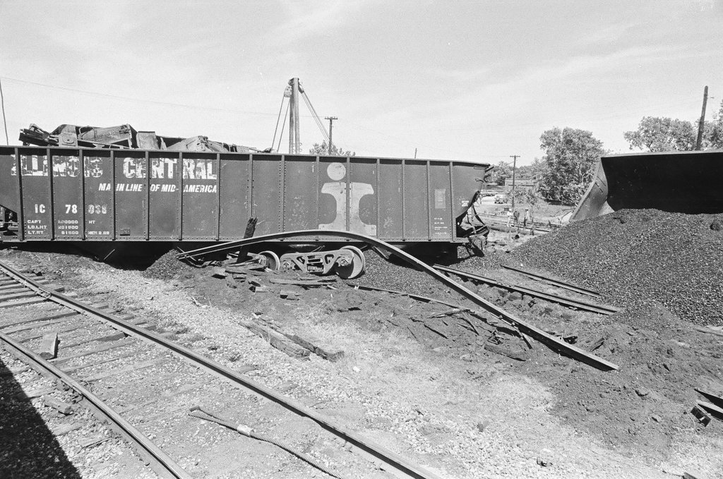 Overturned coal cars - Chicago Sun-Times