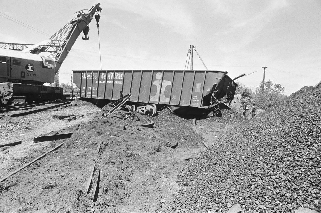 Overturned coal cars - Chicago Sun-Times