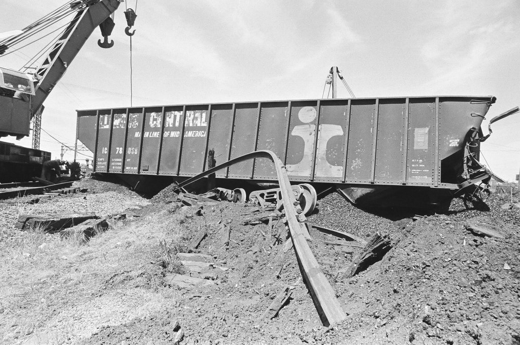 Overturned coal cars - Chicago Sun-Times