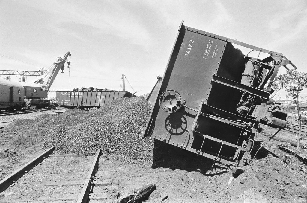 Overturned coal cars - Chicago Sun-Times