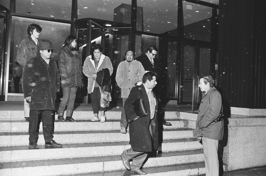 Native Americans escorted out of OEA building - Larry Nocerino for Chicago Sun-Times