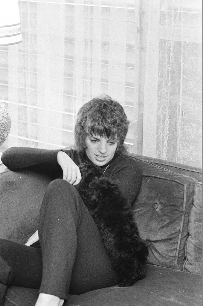 Liza Minnelli sitting on a couch - Chicago Sun-Times