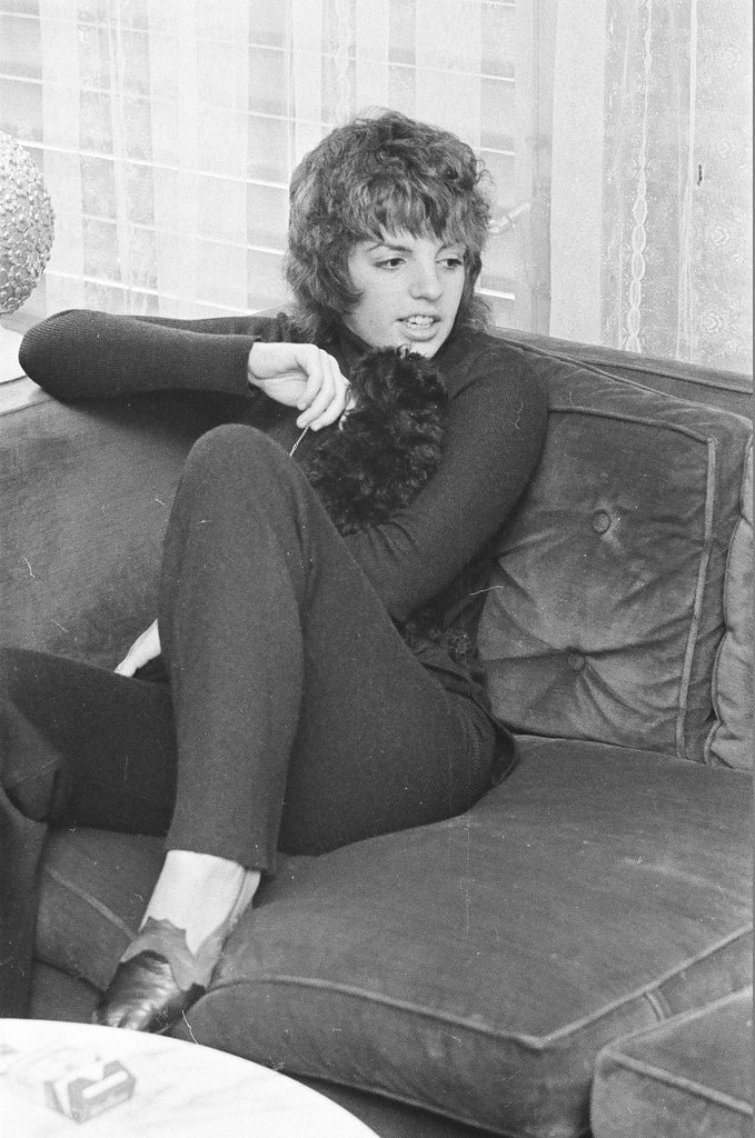 Liza Minnelli sitting on a couch - Chicago Sun-Times