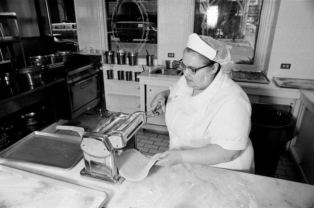 A woman making ravioli at the Pump Room - Chicago Sun-Times