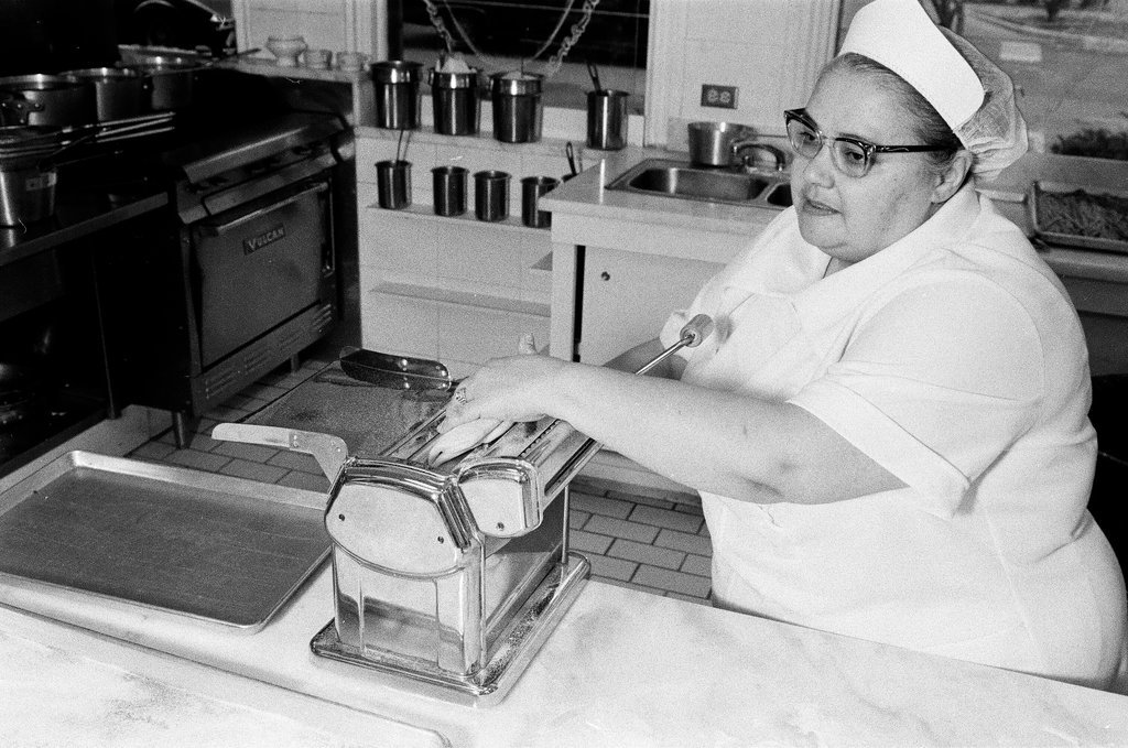 A woman making ravioli at the Pump Room - Chicago Sun-Times