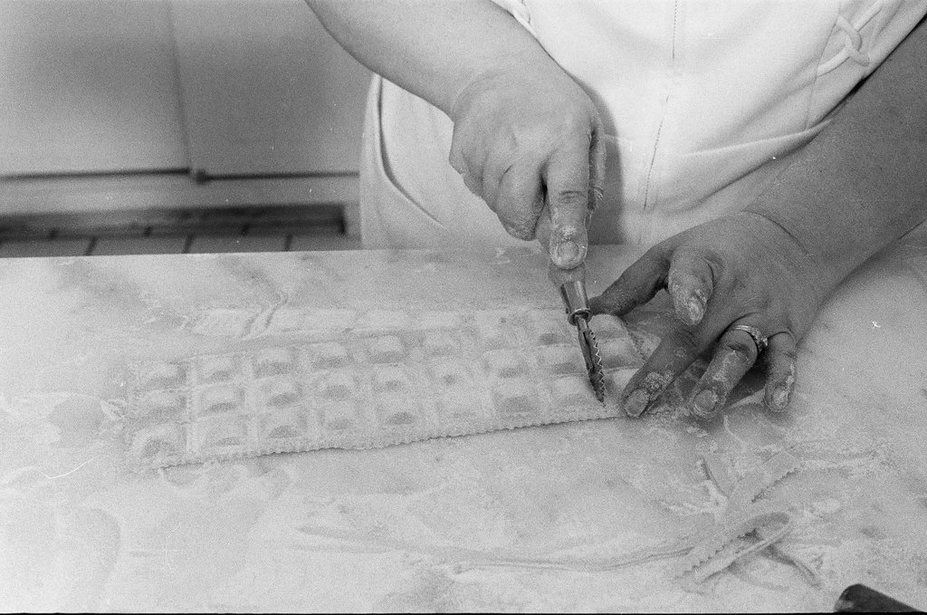 A woman making ravioli at the Pump Room - Chicago Sun-Times