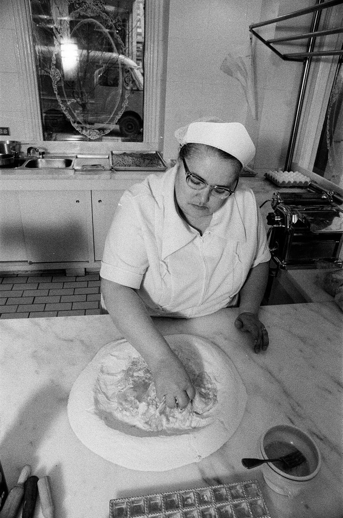 A woman making ravioli at the Pump Room - Chicago Sun-Times