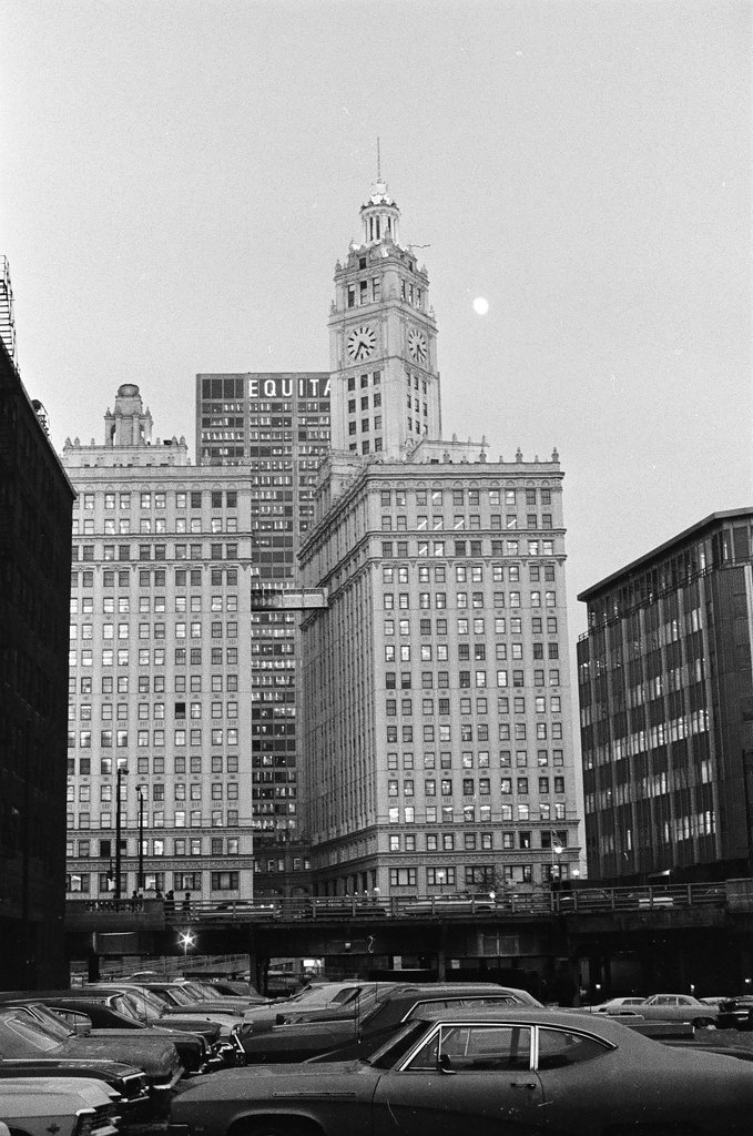 Moon rising above Wrigley Building - Chicago Sun-Times