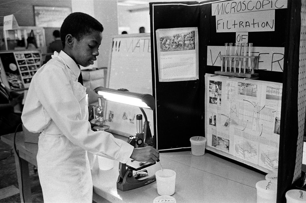 Student pose with their science fair projects - Chicago Sun-Times