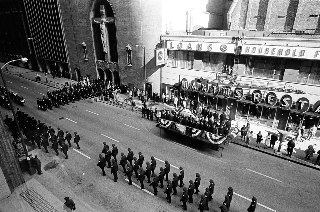 Police cadets enter St. Peter's Catholic Church - Chicago Sun-Times