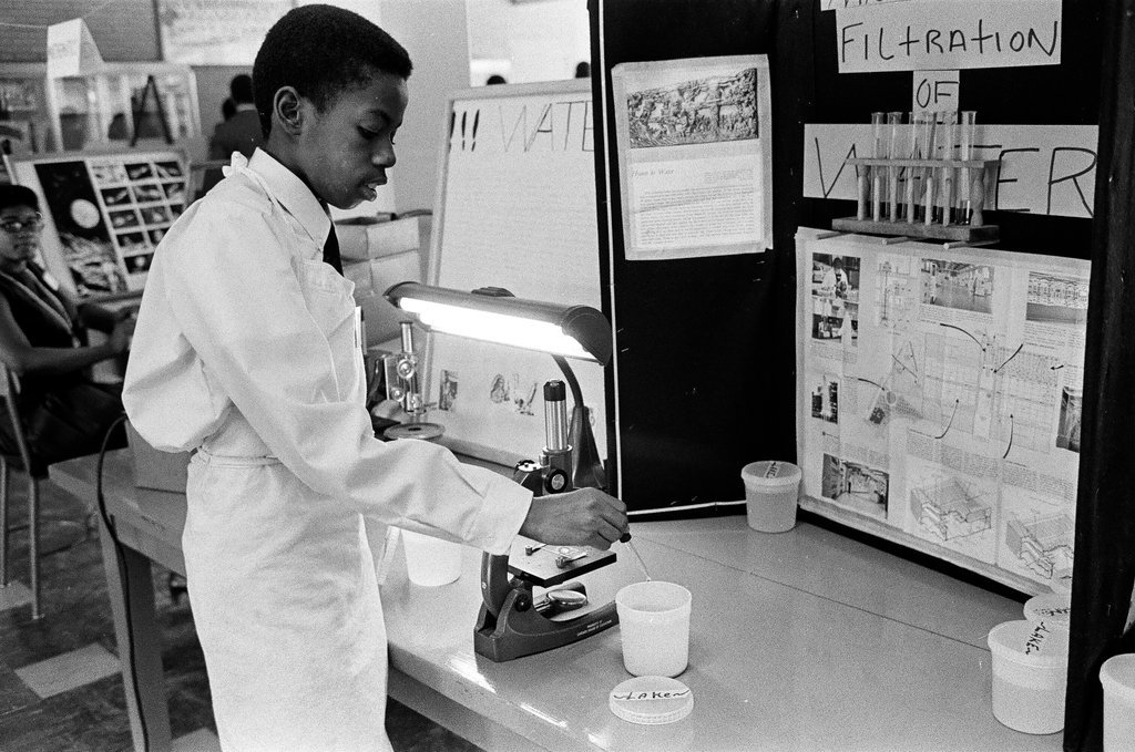 Student pose with their science fair projects - Chicago Sun-Times