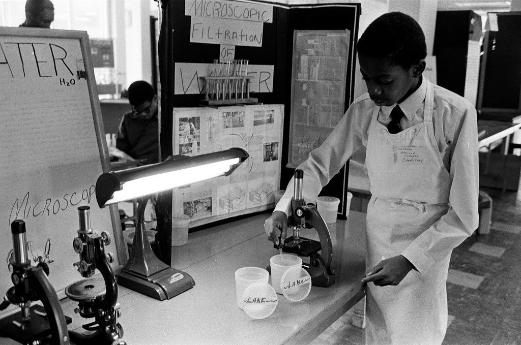 Student pose with their science fair projects - Chicago Sun-Times