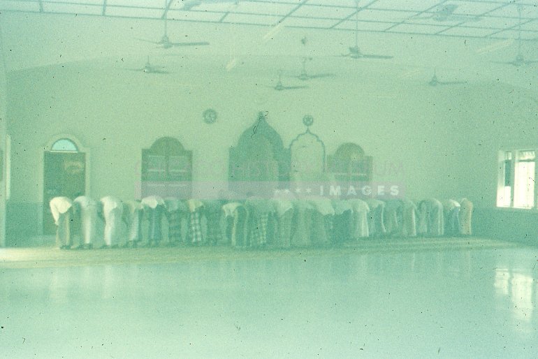 Muslim prayer at mosque - Maier, Vivian
