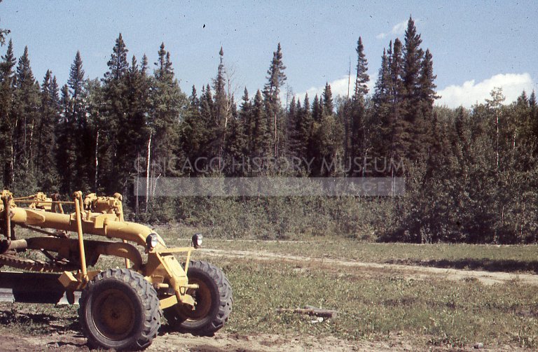 Bulldozer and tree line - Maier, Vivian