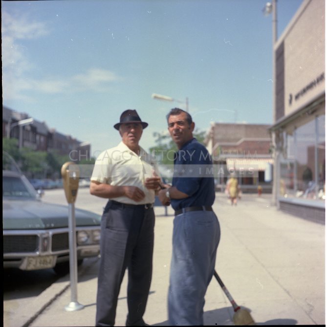 Two men on the sidewalk - Maier, Vivian