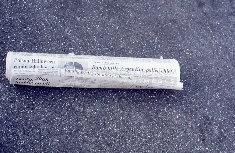 Rolled newspaper - Maier, Vivian