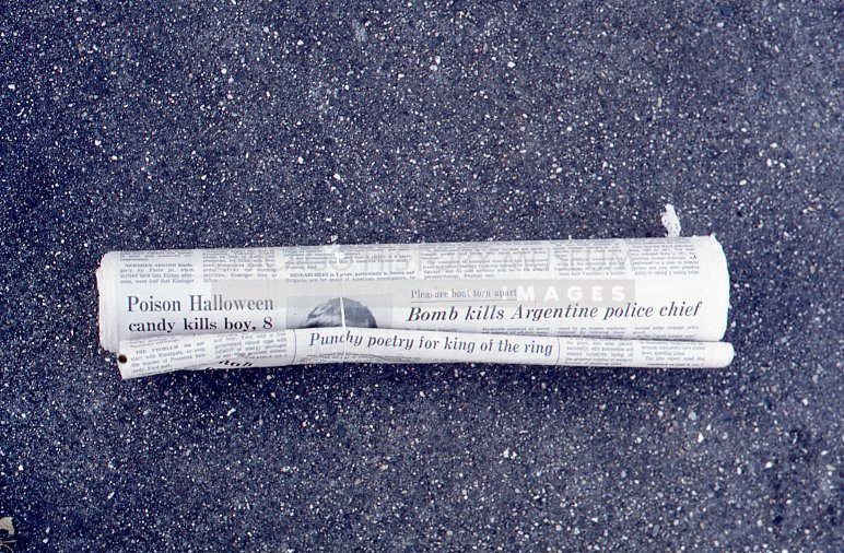 Rolled newspaper - Maier, Vivian