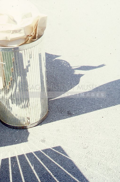 Shadow play with garbage cans at rummage sale at Kenilworth Union Church - Maier, Vivian