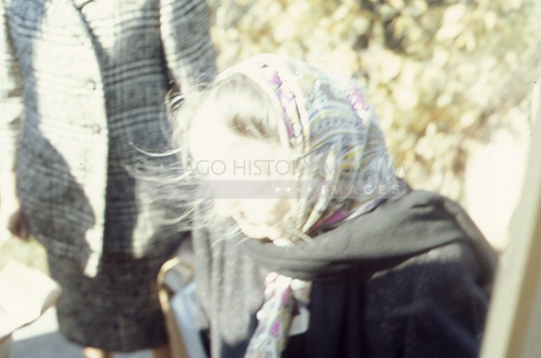 Woman in a headscarf at rummage sale at Kenilworth Union Church - Maier, Vivian