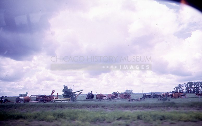 Farm machinery in a field - Maier, Vivian