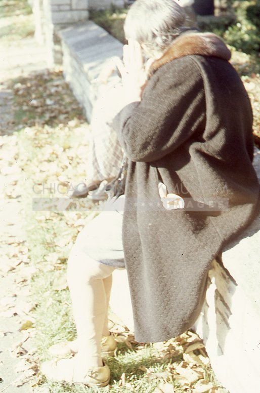 Woman with fur collar at rummage sale at Kenilworth Union Church - Maier, Vivian