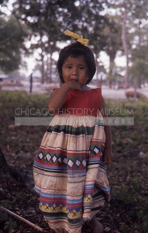 Toddler with yellow bow - Maier, Vivian